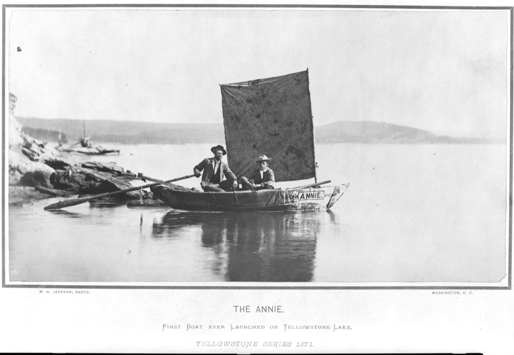 Hayden Expedition members Chester Dawes and Jim Stevenson in the Annie on Yellowstone Lake. The boat was packed in pieces on mules, reassembled and covered in heavy canvas when the expedition reached the lake. Oars were fashioned from timber on site. William Henry Jackson photo, 1871, Library of Congress.