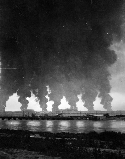 The refining business was dangerous.Midwest Refinery tanks on fire,  1921. Chuck Morrison Collection, Casper College Western History Center  photo.