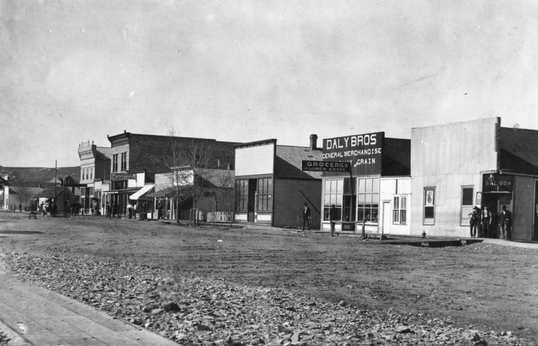 Across the Gillette Avenue from the Dodd House, where a bleeding Allie Means had fled, Noah Richardson was subdued and arrested at the Buffalo Hump Saloon, shown here on the right, ca.1905-1910.   Rockpile Museum.
