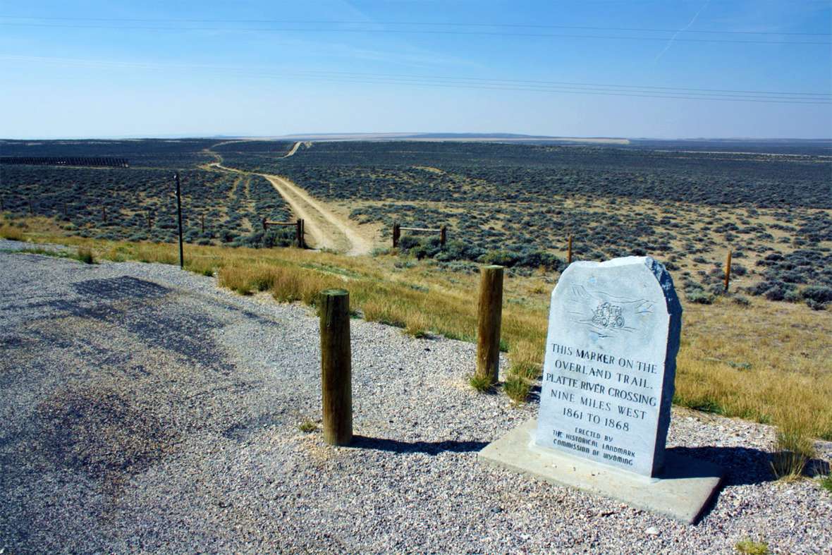 The Overland Trail still crosses wide stretches of treeless Wyoming. This marker is on the spot where the trail crosses Wyoming Highway 130 north of Saratoga, 25 miles southwest of Fort Halleck’s location in the early 1860s and nine miles east of the North Platte River. Tom Rea.