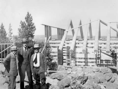 Scientist and educator Hermon Bumpus, left, Rockefeller representative Kenneth Chorley, center, and architect Herbert Maier. Bumpus had recommended series of rustic roadside museums for Yellowstone’s automobile tourists. The men stand in front of one under construction at Madison Junction, 1930. NPS photo.