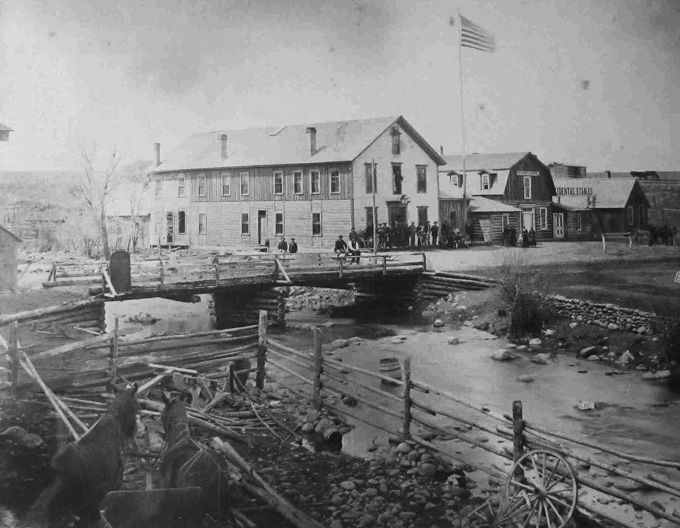 Buffalo, 1883, showing an early bridge over Clear Creek and an early version of the Occidental Hotel. Johnson County Jim Gatchell Memorial Museum.