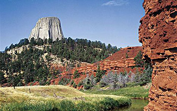 Devils Tower, with the Belle Fourche River in the foreground. Wyoming Official State Travel Website.