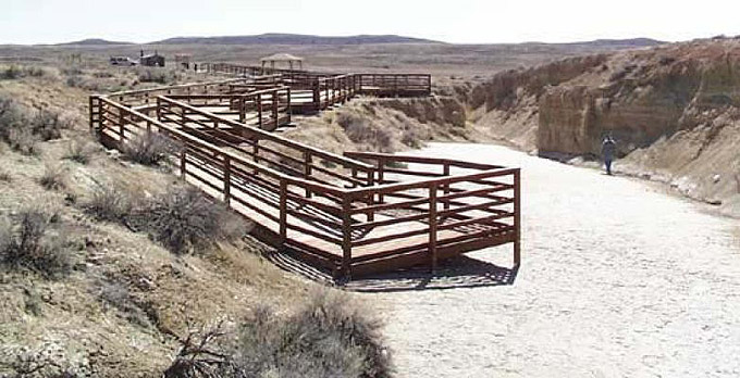 The observation platform at the Red Gulch Dinosaur Tracksite, which features about 1,000 middle Jurassic dinosaur tracks in hard limestone. BLM photo.