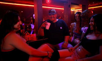 A gas-field worker enjoys himself during Rock Springs' most recent boom. New York Times.