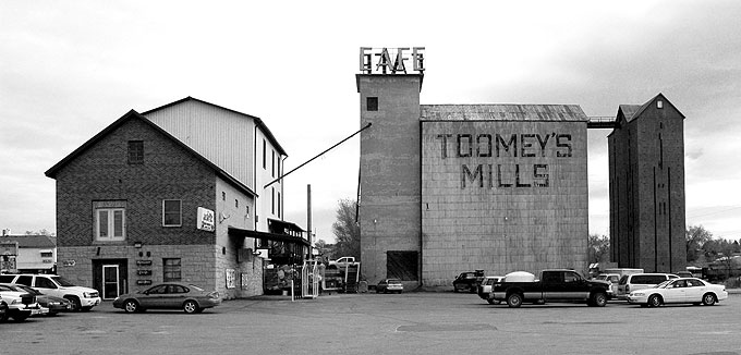 The mill at Toomey's Mills ground flour by day and generated electricity for Newcastle's street lamps at night. Wyoming SHPO photo.