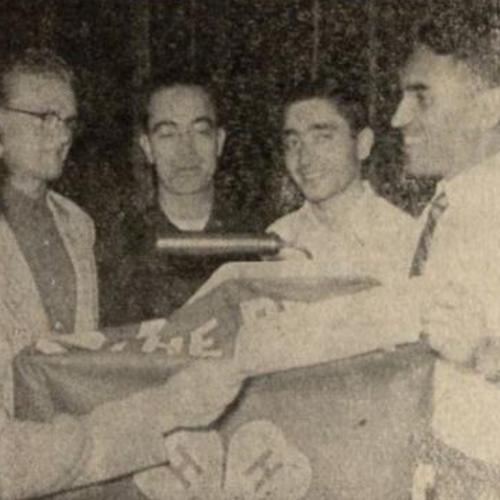 UW student Ghulam Nabi, center, wins an honorary membership in the Wyoming Collegiate 4-H Club, ca. 1959. Courtesy Aziz Salem.