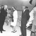 UW President Humphrey presents Afghan Queen Humaira with roses as she and the king, right, prepared to leave Cheyenne on a U.S. Air Force jet. American Heritage Center.