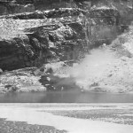 Hot springs, steaming here from the floor of Alcova Canyon in 1894, were later drowned by Alcova Reservoir. American Heritage Center.