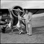 Celebrities were sometimes flown in to the ranch, often during hunting season. Here, Hollywood cowboy actor Wallace Beery poses with a pair of trophies. Buffalo Bill Center of the West.