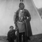 Arapaho members of the cast of "The Covered Wagon" traveled to London and Paris in 1923 to act in stage prologues before the movie showings. Shown here, Yellow Horse and an unidentified boy in London. Lander Pioneer Museum.