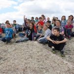 Fourth graders from Oregon Trail Elementary School, Casper, Wyo. on the top of Independence Rock, May 2013. Tom Rea photo.