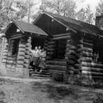 A 1931 log-on-stone custodian’s residence was the first building at Devils Tower National Monument to be designed under official parkitecture standards. NPS.