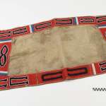 Ute saddle blanket ca. 1855-60 with horseshoe design made of hide, wool cloth, glass pony beads, sinew and cotton thread. NMAI, Smithsonian Institution, catalog number 8/8055.