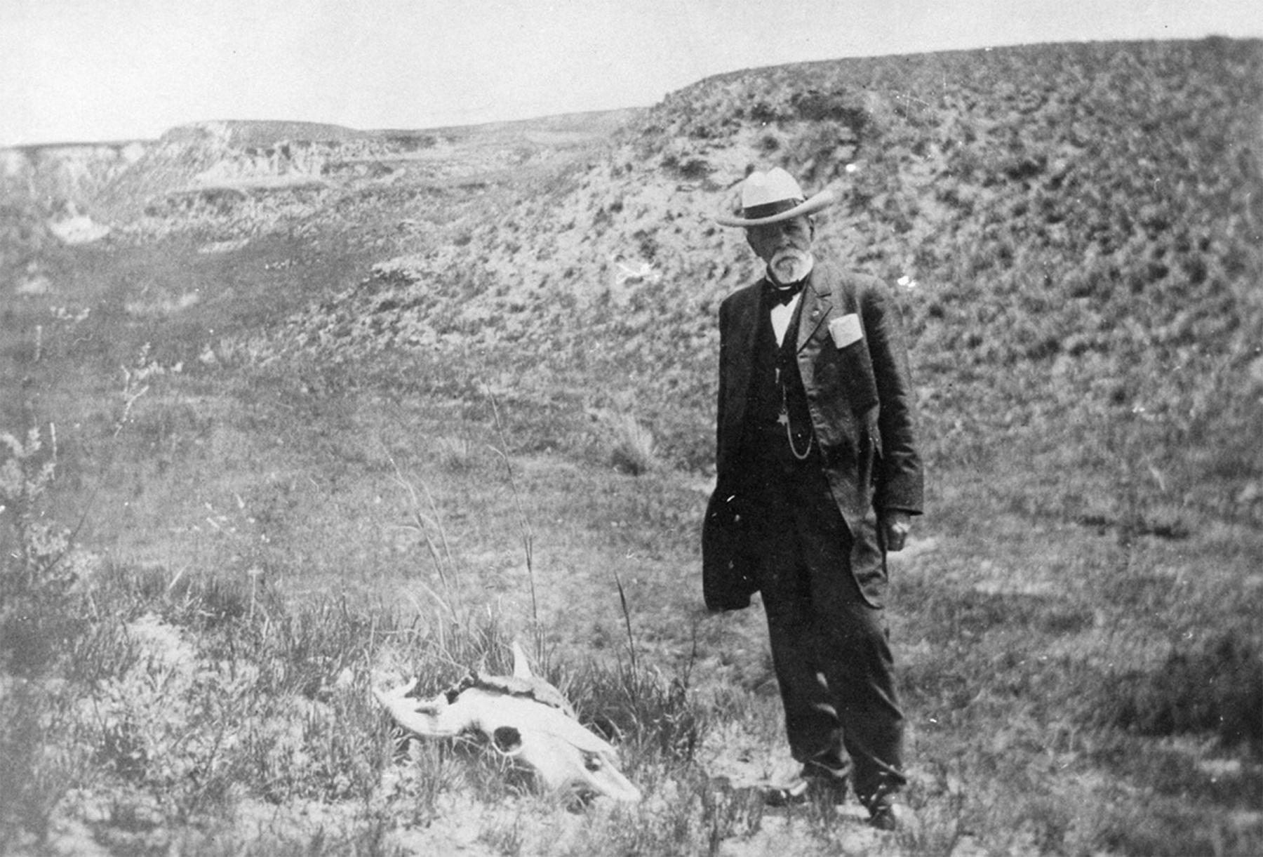 Key to the 1906 passage of the Antiquities Act was Republican Rep. John Lacey of Texas, chairman of the House Public Lands Committee. For every bill he backed for conserving public lands, he backed another for developing them. It worked. Here, he contemplates a bison skull that year in Texas. Boone and Crockett Club.