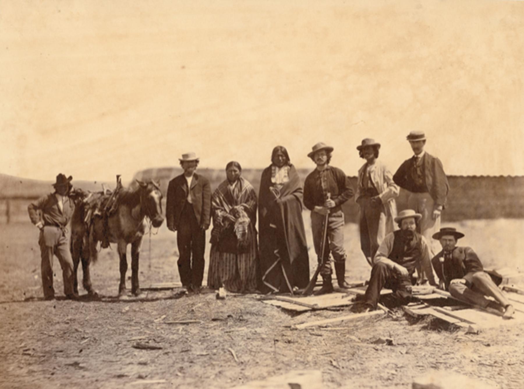 Oglala Lakota Sioux men, women, and children cross the North Platte River by ferry near Fort Laramie, 1868. Sherman collection of Gardner photographs, NMAI 