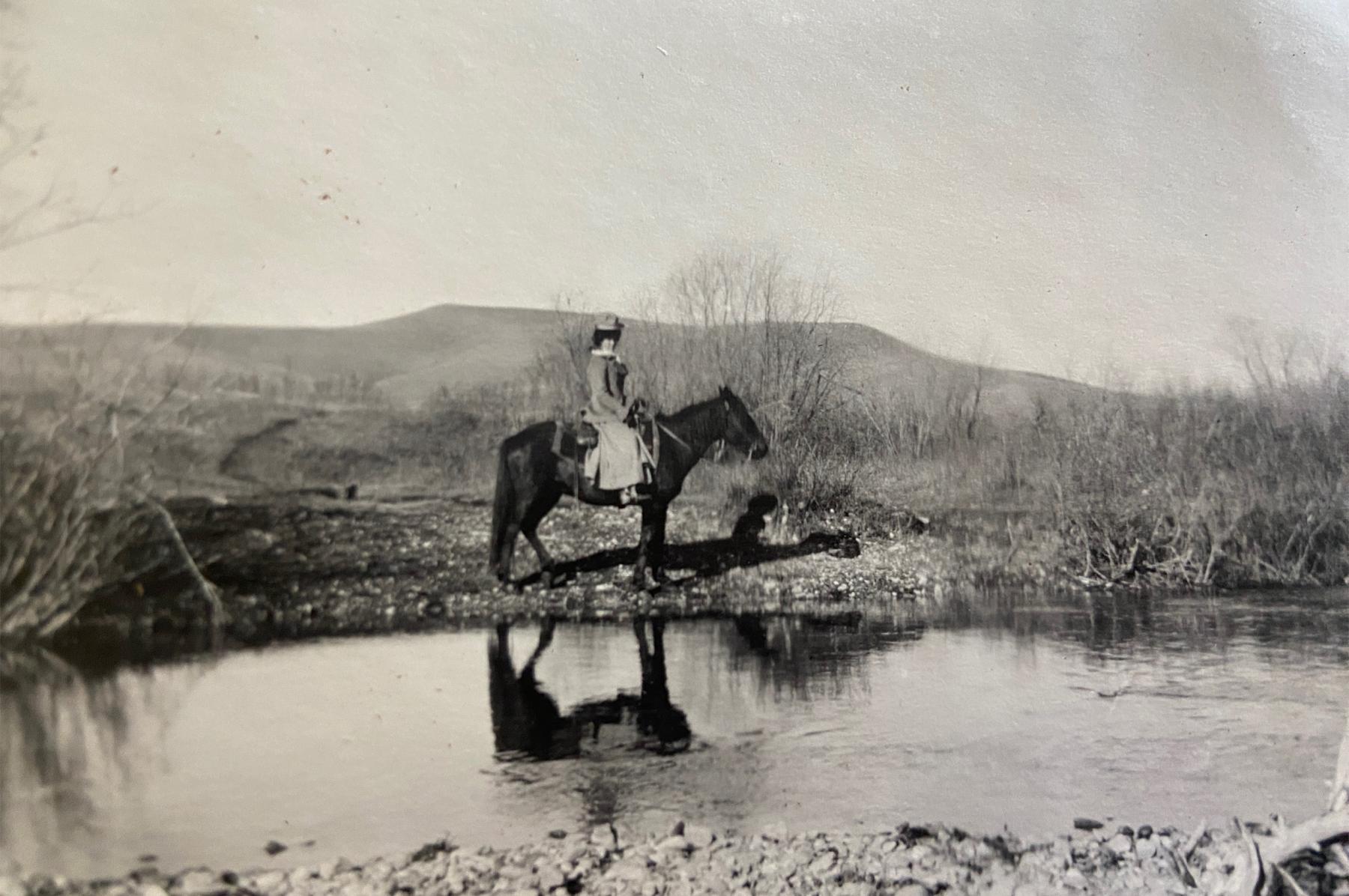 Investigating the Bozeman Trail from the Powder River crossing north to Fort C.F. Smith in Montana, Vie, shown here about 1910, rode long stretches of the trail on horseback. She was working less than 45 years after the events she was writing about. Garber family photo.