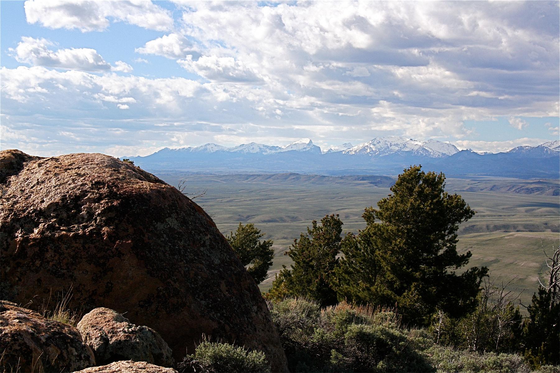 Looking north from Pacific Butte across South Pass to the Wind River Range. When Bonneville came through here with wagons in 1832, he was well behind the main supply trains and too late for Rendezvous. Barbara Dobos photo. 