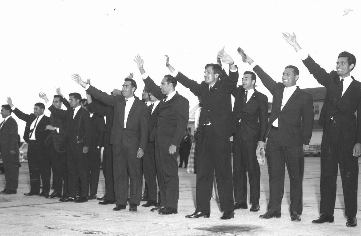 Afghan students enrolled in U.S. universities wave good-bye to their king and queen at the Cheyenne airport, September, 1963, as the royals start on the next leg of their tour that will take them to San Francisco. American Heritage Center. Afghan students enrolled in U.S. universities wave good-bye to their king and queen at the Cheyenne airport, September, 1963, as the royals start on the next leg of their tour that will take them to San Francisco. American Heritage Center.