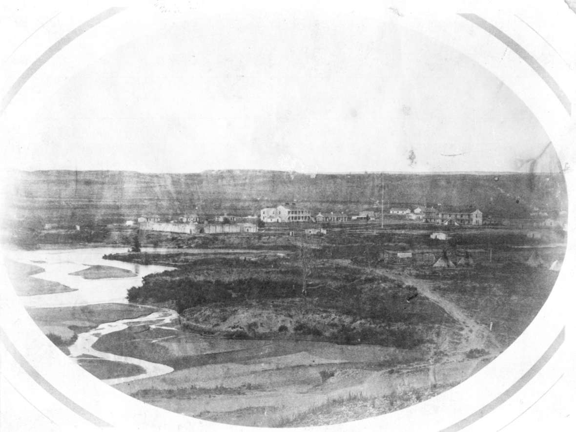 Photographer Samuel. C. Mills made the earliest known photograph of Fort Laramie in 1858. In the left middle ground are ruins of the 1841 adobe structure, officially known as Fort John. Old Bedlam, the bachelor officers’ quarters with its two-story porch, dominates the parade ground. Tipis stand in the right foreground. "The town of Larimie,” Mary Jane Guill wrote in 1860, "is full of Indians their Wigwams all through town except on main street.” Beyond the lodges is the Ward and Guerrier trading post. The 1860 census provided a statistical snapshot of the area. Library of Congress via Wikipedia. Click to enlarge