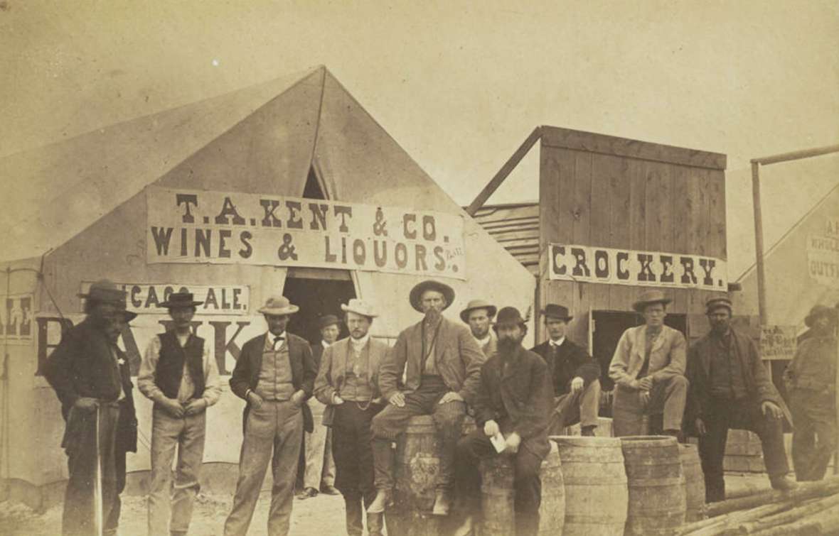 Some residents of the end-of-tracks town of Benton on the Union Pacific, 1868, near where it crosses the North Platte River. The Frontier Index appears to have been published here for a few weeks that summer. The paper was also published at Fort Sanders, near Laramie; Laramie; Green River City; Bryan; and Bear River City, near present Evanston, Wyo. A.C. Hull photo.