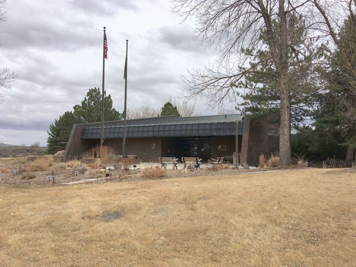 The Bighorn Canyon Visitor Center, completed in 1976 near Lovell, Wyo., was the first National Park Service building to use solar collectors. NPS photo.