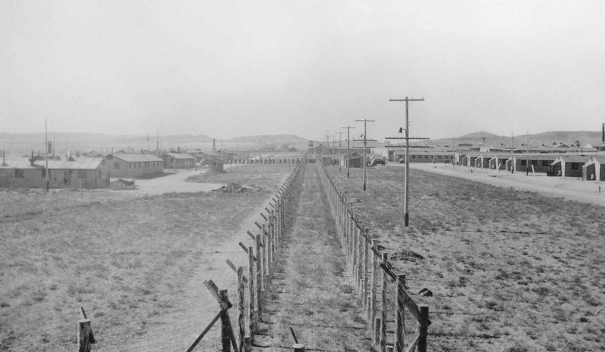 At Camp Douglas, a German noncommissioned officer was found hiding in the attic of an old camp building, reportedly hiding from pro-Nazi camp leaders. Afterward, the Army paid closer attention to security, installing double fences around the compounds and using guard dogs. Wyoming State Archives. At Camp Douglas, a German noncommissioned officer was found hiding in the attic of an old camp building, reportedly hiding from pro-Nazi camp leaders. Afterward, the Army paid closer attention to security, installing double fences around the compounds and using guard dogs. Wyoming State Archives.