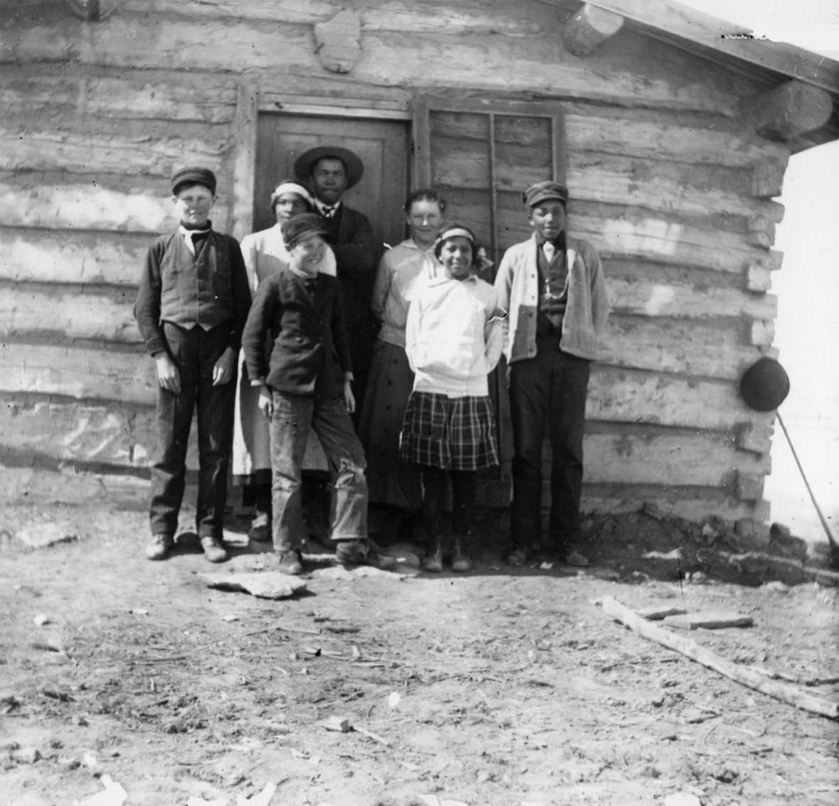 Olson and Stepp children at the school on the Stepp Ranch at the mouth of Fontelle Creek on the Green River, around 1912. The Stepps were the only Arican-American homesteaders in the upper Green River valley. Left to right, Arnold and Elmer Olson; Helen, John, Gladys, Nell and Bill Stepp. Stepp family photo.