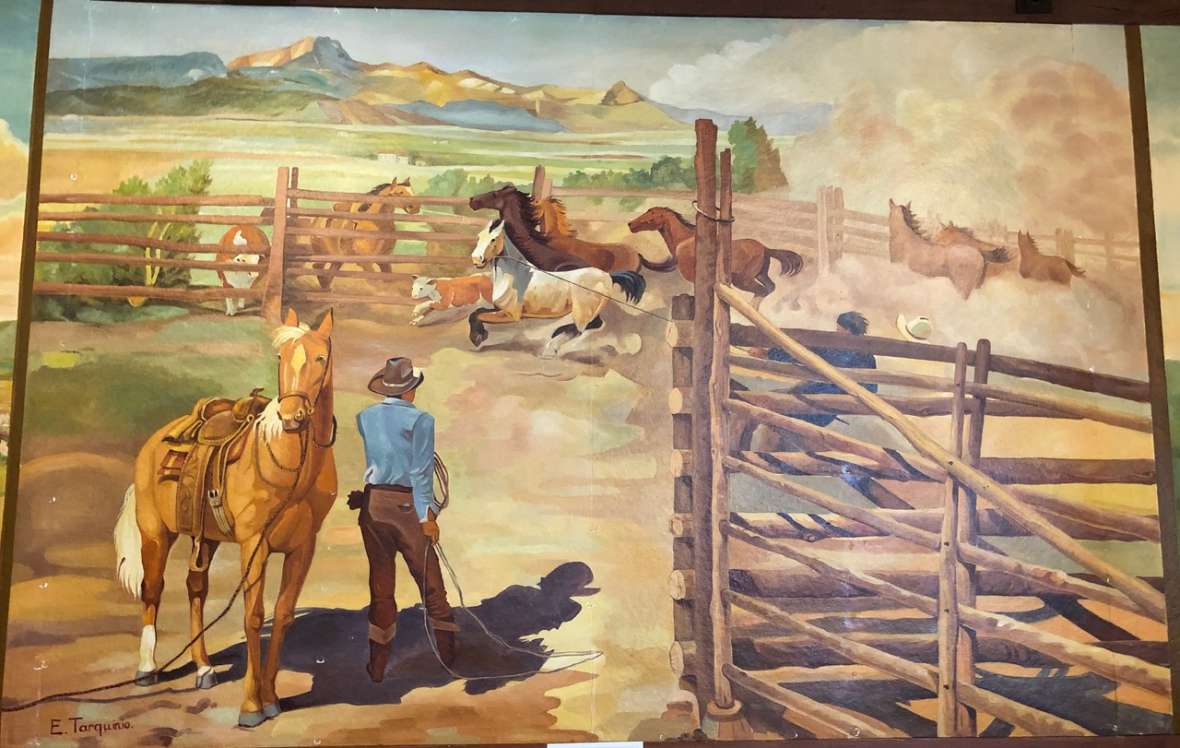 One of several western-themed murals by Italian POW Enzo Tarquinio painted in 1943-44 at the Camp Douglas officers’ club, Douglas, Wyo. Tarquinio and two other prisoner-artists used pictures by William Henry Jackson and Charlie Russell as starting points, but added some personal touches. Laura E. Ruberto photo. Click to enlarge. One of several western-themed murals by Italian POW Enzo Tarquinio painted in 1943-44 at the Camp Douglas officers’ club, Douglas, Wyo. Tarquinio and two other prisoner-artists used pictures by William Henry Jackson and Charlie Russell as starting points, but added some very Italian touches. Laura E. Ruberto photo. Click to enlarge.