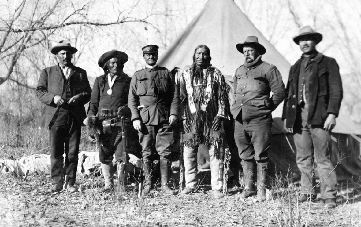 Negotiators for the government at the Big Talk on Powder River, November 1906. Left to right, interpreter Peter Shangreau; Lakota Sioux elder Woman’s Dress; Maj. Grierson, Sixth Cavalry; Lakota elder American Horse; Capt. Carter P. Johnson, 10th Cavalry; interpreter Frank Goings. The Utes came to trust Johnson more than any of the other white men they dealt withT.W. Tolman photo, Campbell County Rockpile Museum.