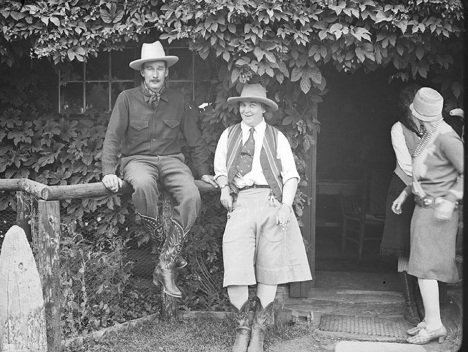 Larry Larom, shown here with dudes in the 1930s, bought the Valley Ranch on the South Fork of the Shosone River southwest of Cody in 1915. Larom transformed bunkhouse-style accommodations to ones luxurious enough to attract upper-class guests, especially women. Charles Belden photo, American Heritage Center.