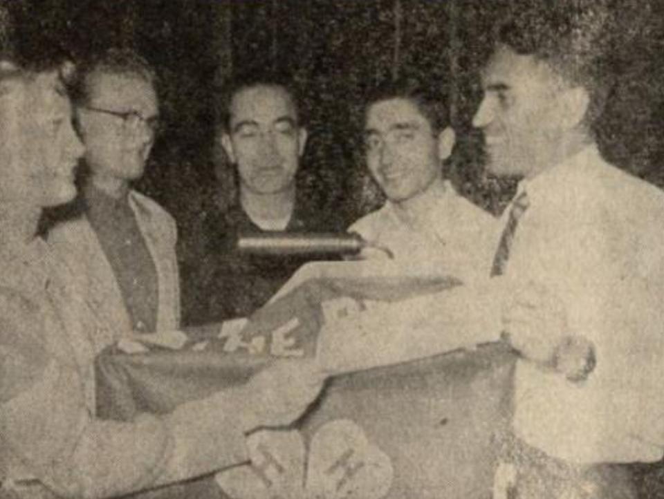 UW student Ghulam Nabi, center, wins an honorary membership in the Wyoming Collegiate 4-H Club, ca. 1959. Courtesy Aziz Salem.