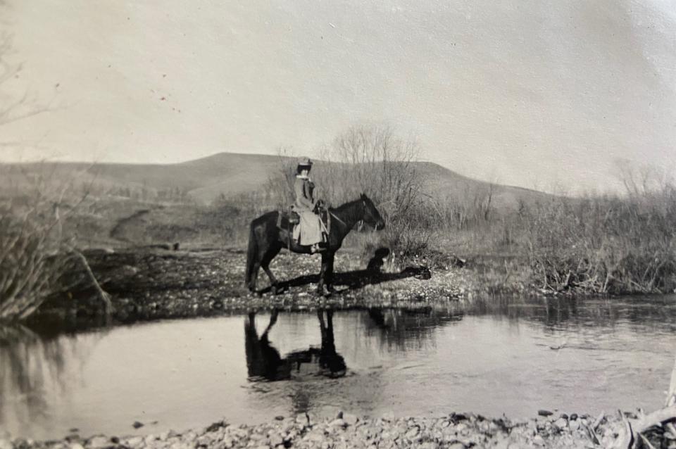 Investigating the Bozeman Trail from the Powder River crossing north to Fort C.F. Smith in Montana, Vie, shown here about 1910, rode long stretches of the trail on horseback. She was working less than 45 years after the events she was writing about. Garber family photo.