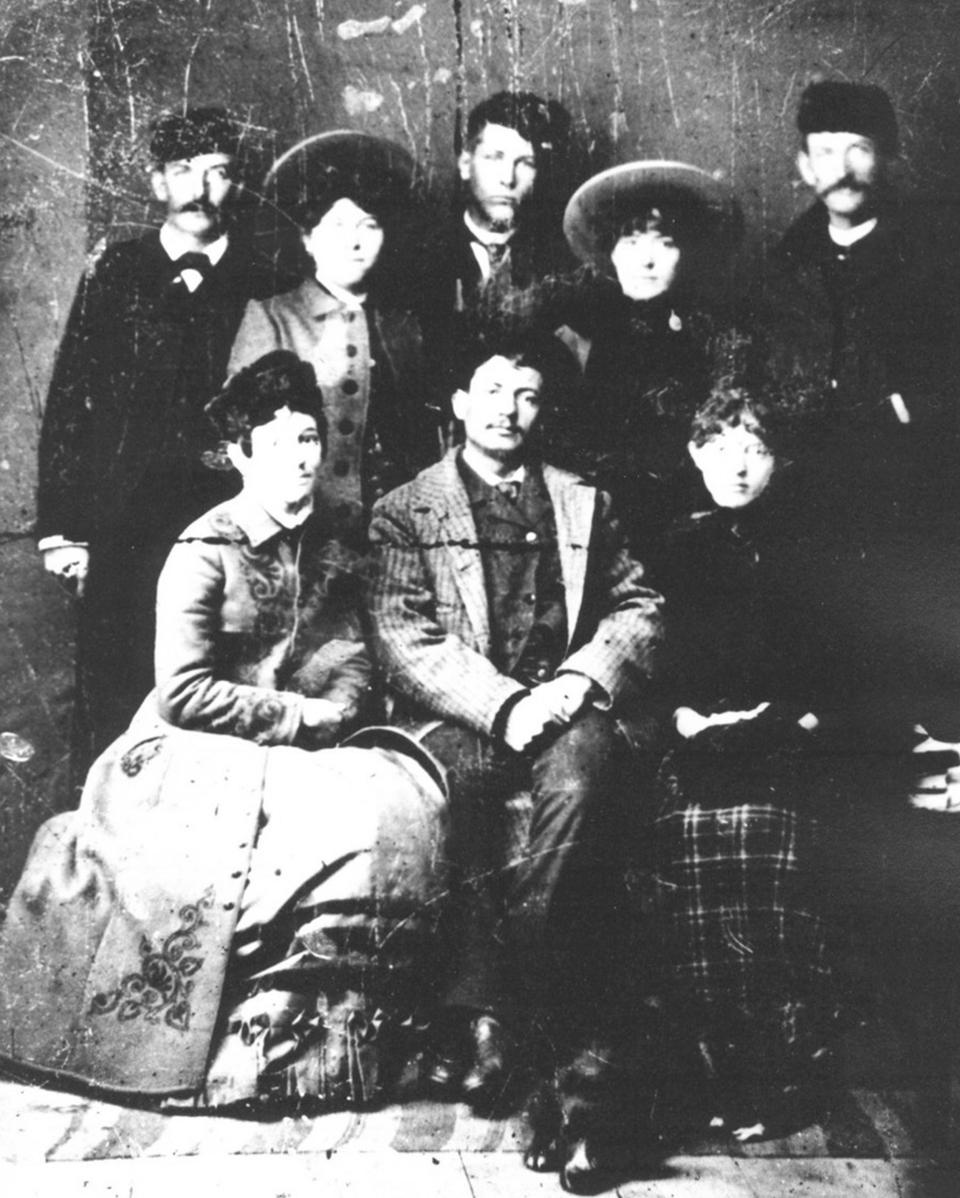 Annie Wilkerson, front left, and Frank Canton, back row right, out with friends sometime before their marriage in 1885. Johnson County Library photo.