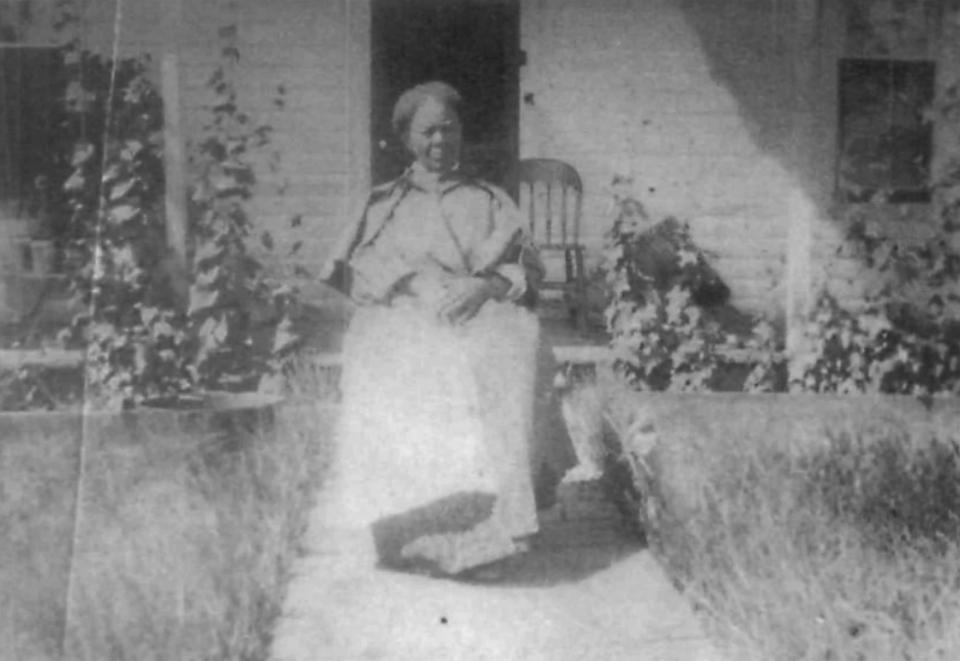 Marchbanks ca. 1905. Photo courtesy of the Williams Collection, Crook County Museum, Sundance. portrait of an elderly woman sitting in a garden