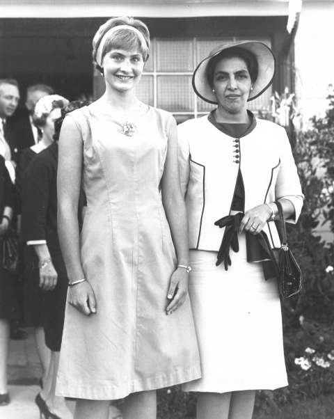 Queen Humaira, right, asked that her photo be taken with Miss Tierney, who helped serve the tea at the Lembcke ranch south of Laramie during the royals’ visit, September 1963. American Heritage Center.
