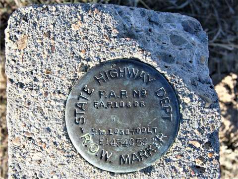 This Federal Aid Project (FAP) marker was found west of Ten Sleep along Washakie County Road 580A, the 1936 route of the Black and Yellow Trail. ‘FAP No. 108D’ was the number assigned to the road in this area. Some concrete culverts are also still in place. Authors photo, 2013.
