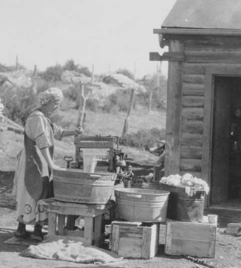 Ethel on laundry day, 1917, at the family’s new gasoline-powered Maytag washing machine. Love family photo. Ethel on laundry day, 1917, at the family’s new gasoline-powered Maytag washing machine. Love family photo.