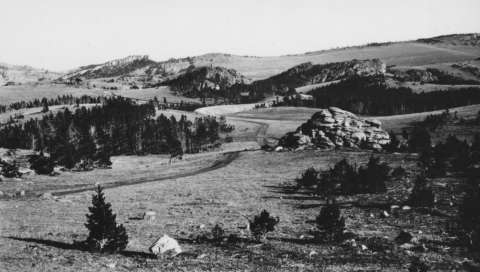 The rolling limestone plateau, much of it above 9,000 feet, 30 miles east of Lovell, Wyo., and 12 miles south of the Montana border is an important prehistoric archeological landscape as well as an ancient Native American spiritual site—where tribal ceremonial activity continues to this day. This photo was taken in 1934; the country looks much the same now. American Heritage Center.