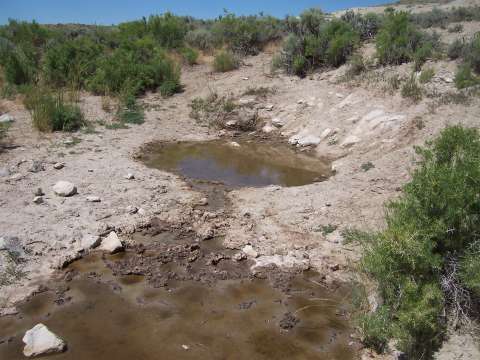 Remains of wells at the Dug Springs stage station. Wells at stage stations were crucial to travel along the Overland Trail. Author photo. Remains of wells at the Dug Springs stage station. Wells at stage stations were crucial to travel along the Overland Trail. Author photo.