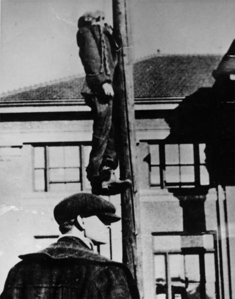 Edward Woodson, lynched by a mob at the train depot in Green River on December 10, 1918. Sweetwater County Historical Museum. Edward Woodson, lynched by a mob at the train depot in Green River on December 10, 1918. Sweetwater County Historical Museum.
