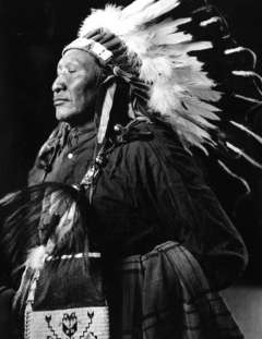 When Lone Bear objected that the government’s offer was too low, Yellow Calf, shown here in traditional dress, not yet a council chief of the Northern Arapaho, suggested some changes in the government’s proposal. Joseph Dixon photo, Wyoming Veterans Memorial Museum.