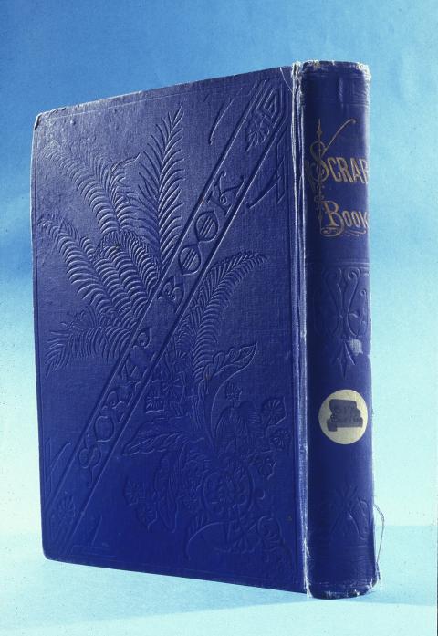 Cover of a commercial “Mark Twain's Scrap Book,” the Victorian-era blank scrapbook Monte used to collect her newspaper clippings and personal memorabilia. Monte Grover Scrapbook, Toppan Rare Books Library, American Heritage Center, University of Wyoming. hardbound book with leather cover and "Scrap Book" on its spine