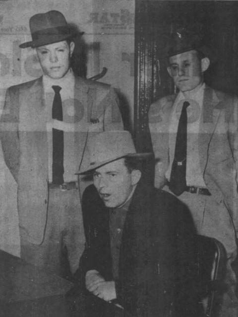Three men in suits and fedoras