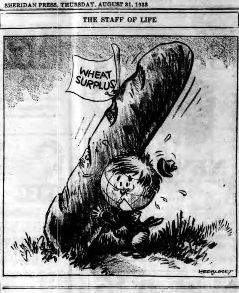 political cartoon from the Sheridan Press showing a small man, with a world globe for a head, propping up a loaf of bread twice his size, flagged with the words "Wheat Surplus"