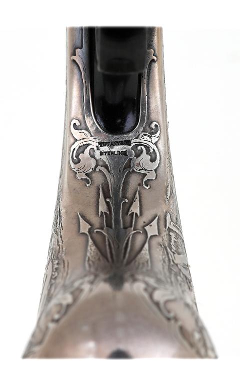 The words "TIFFANY" and "STERLING" appear at the edge of some decorative fourishes
