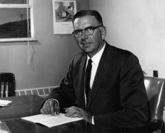 In May 1970, officials led by Casper-Midwest Schools Superintendent Maurice Griffith, shown here, called meetings for public comment on the long-hair issue. The next month, the board dropped its rules against long hair. Casper College Western History Center.